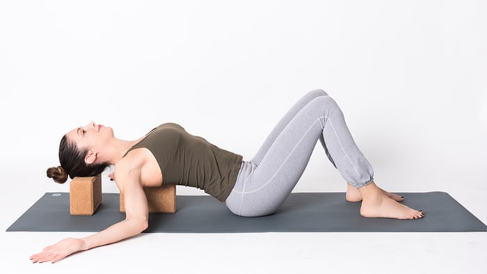 5 Yin Yoga Postures To Try With A Bolster - Billabong Retreat Sydney